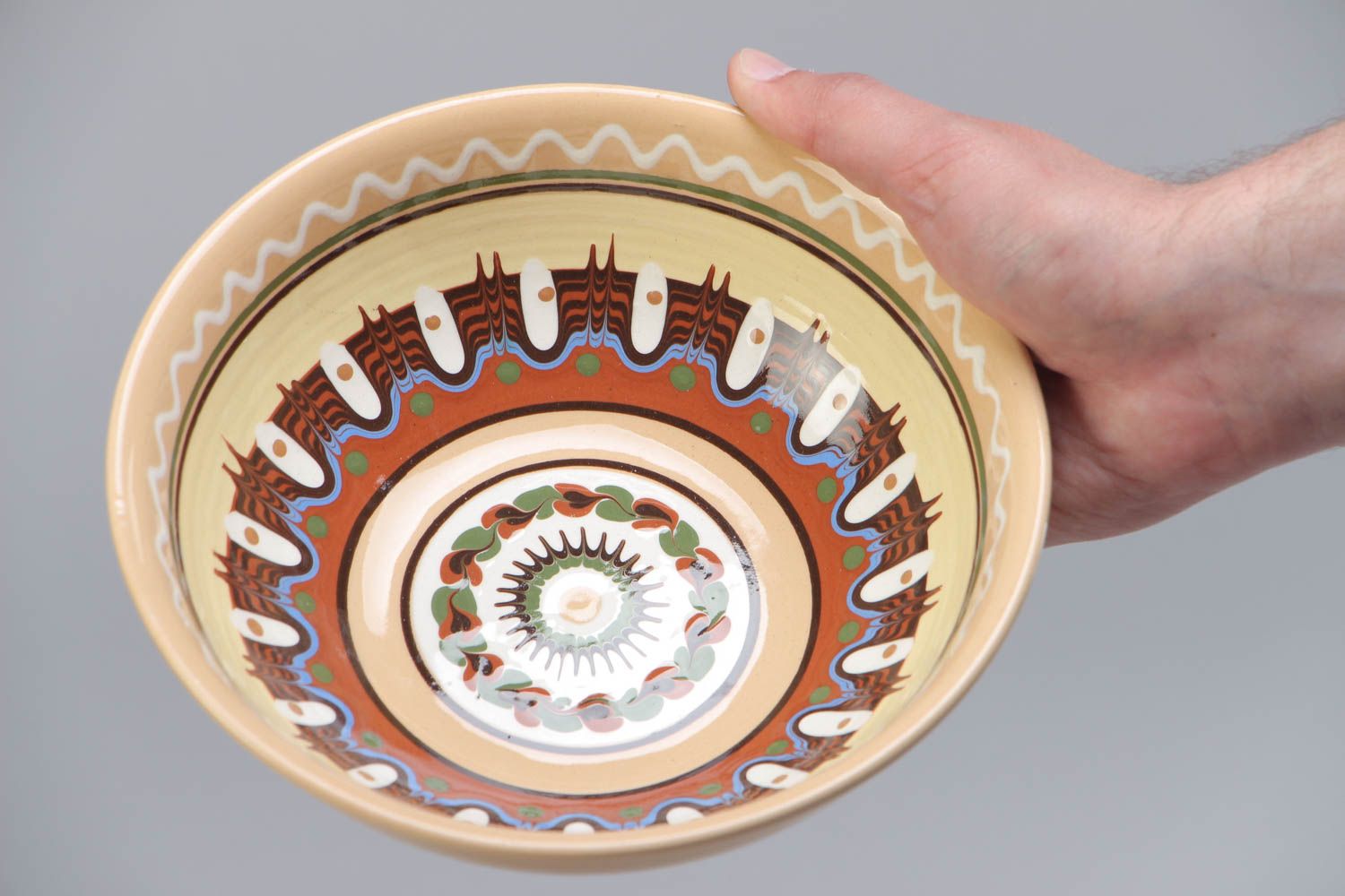 Homemade decorative ceramic bowl painted with glaze in ethnic style for 600 ml photo 5