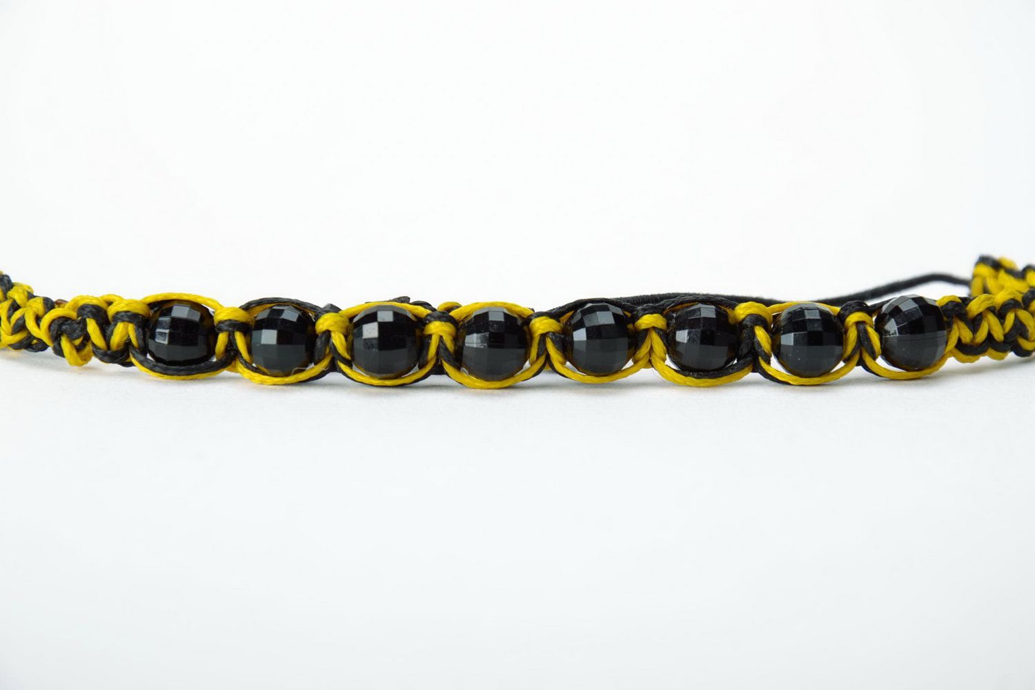 Pulsera original de color negro y amarillo foto 3