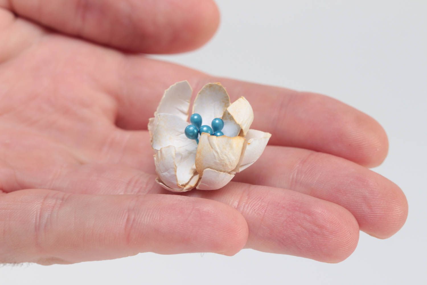 Small homemade decorative painted beige paper flower with blue stamens  photo 5