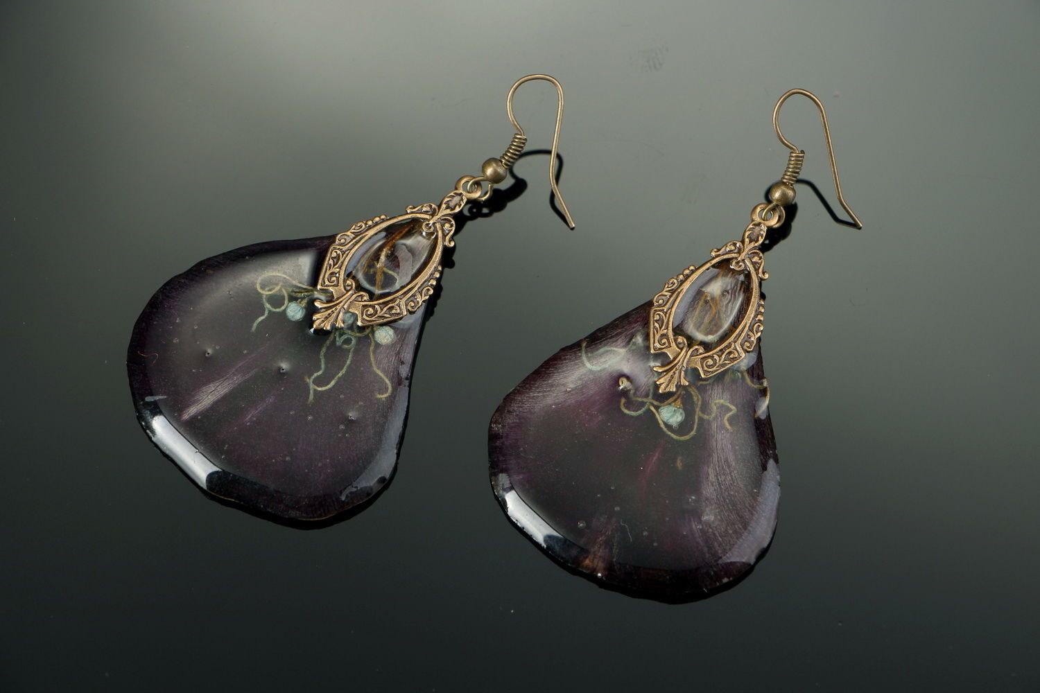 Earrings made of tulips and covered with epoxy resin photo 1