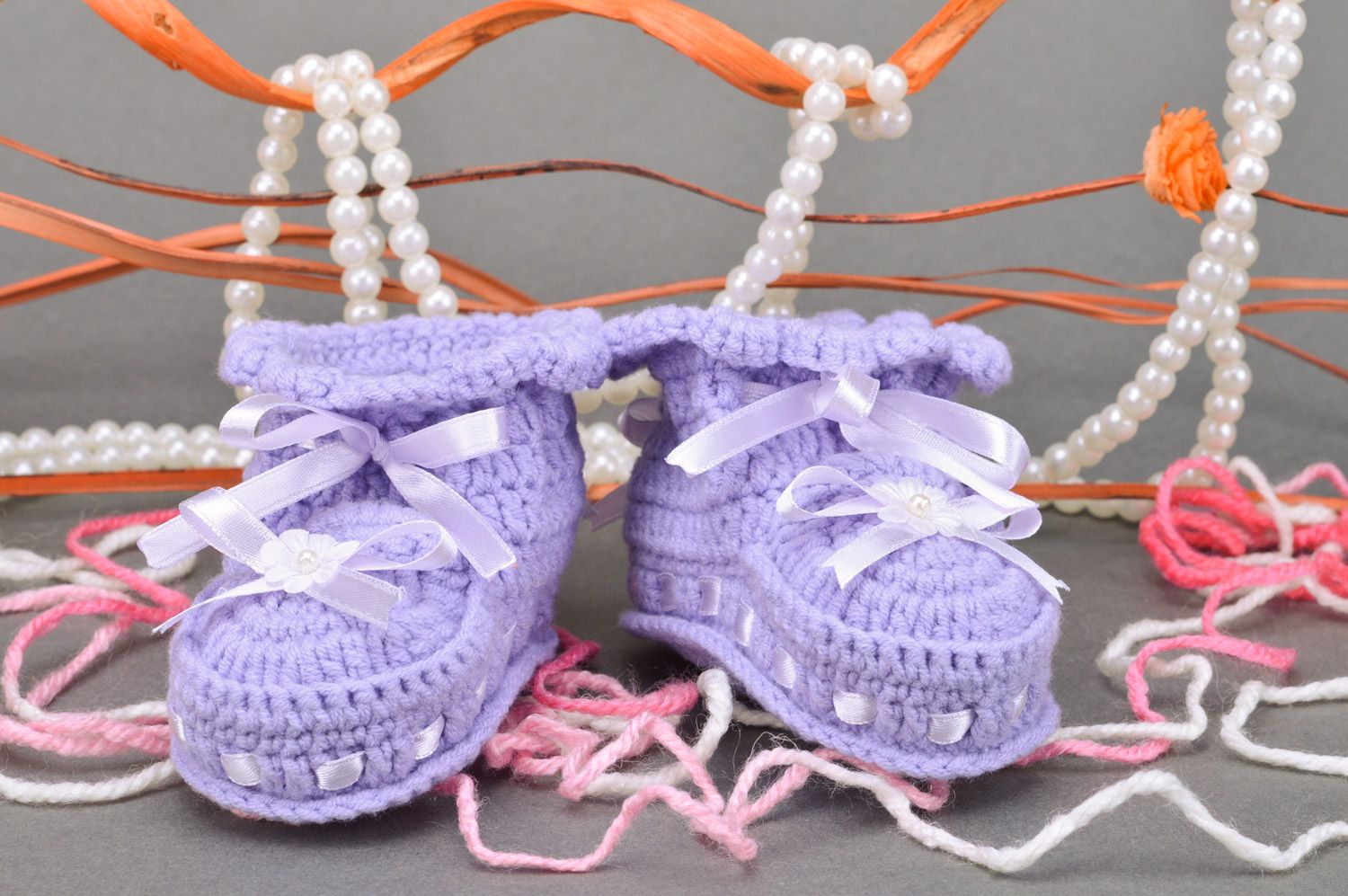Summer small handmade booties for a baby-girl with a lilac satin ribbons photo 1