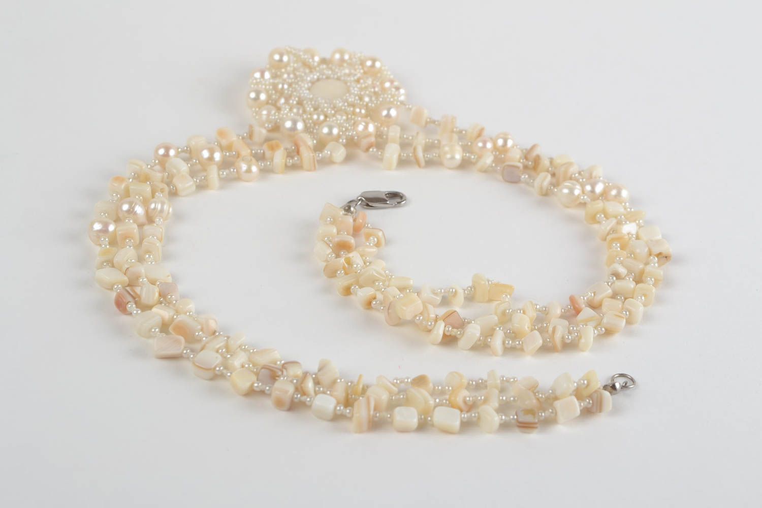 Beautiful gentle handmade necklace woven of beads and natural stone photo 4