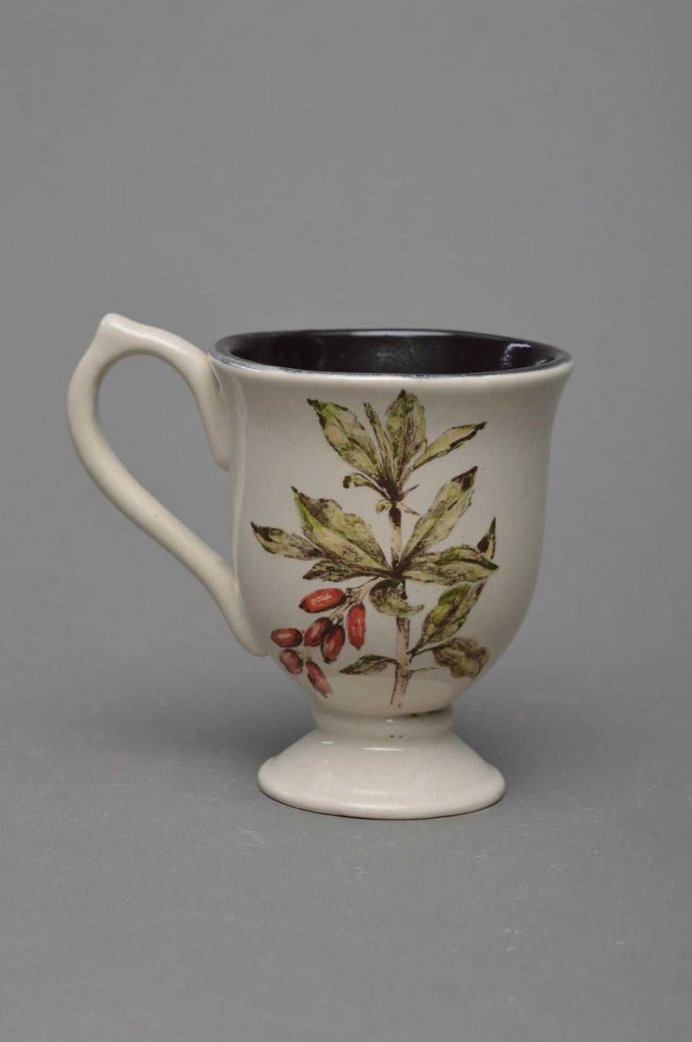 Handmade elegant porcelain glazed white and black coffee cup with barberry image photo 1