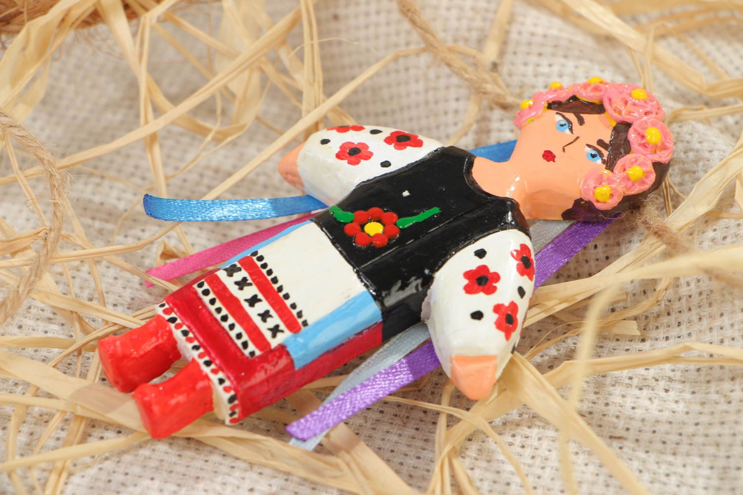 Handcrafted decorated with designs refrigerator magnet in the form of Ukrainian girl made of plaster photo 1