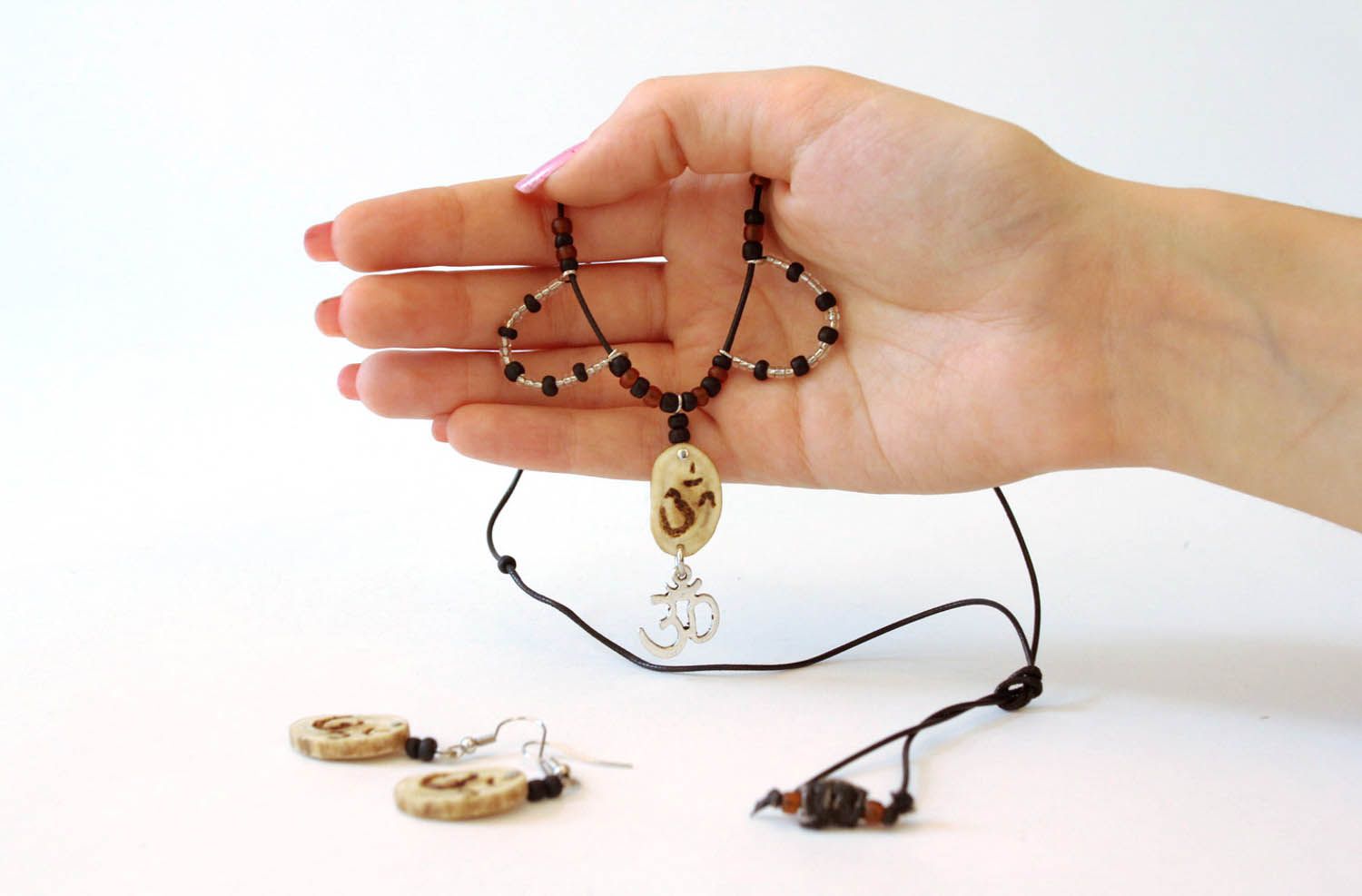 Set of natural horn jewelry Ohm photo 1