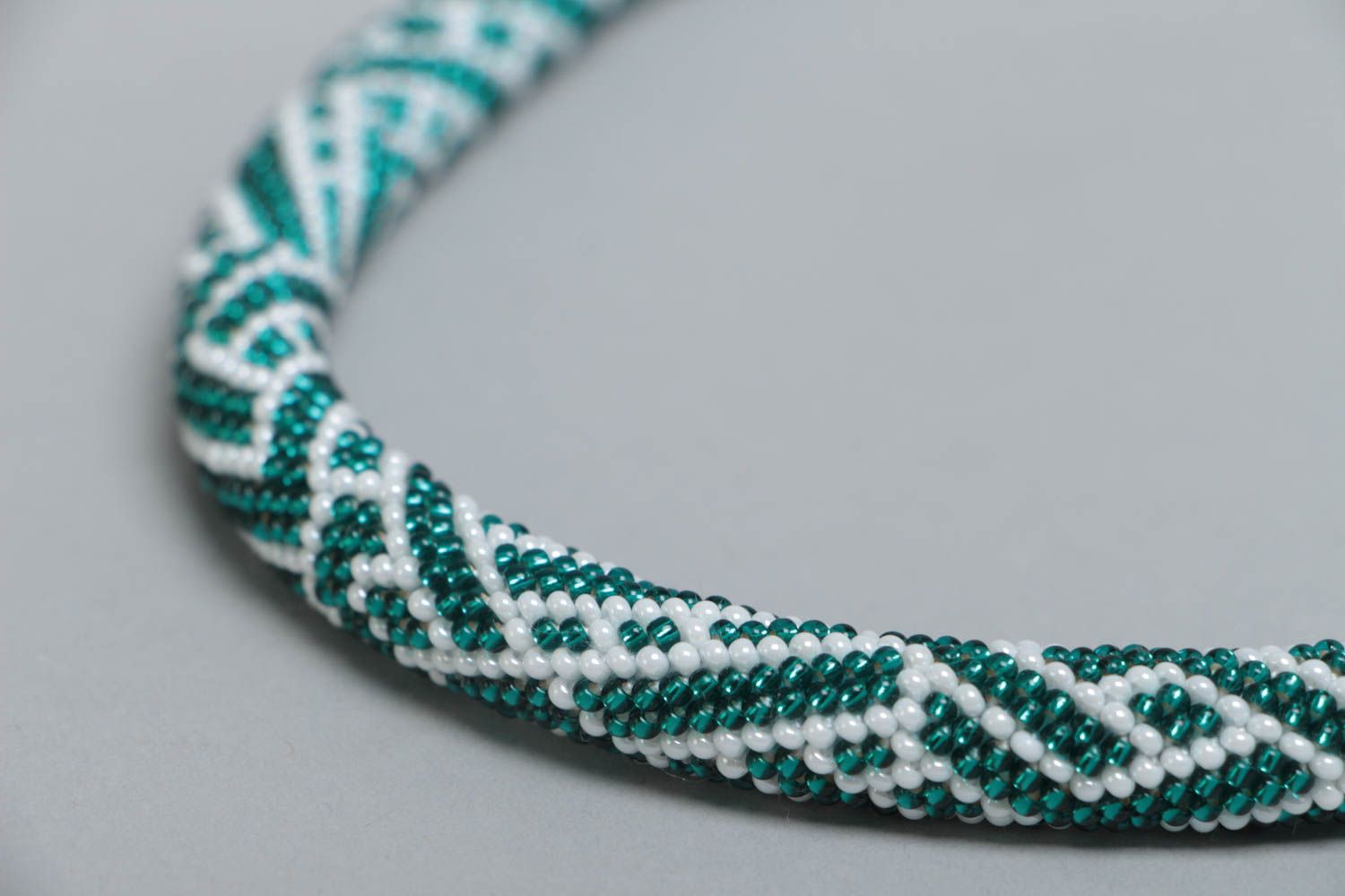 Handmade designer beaded cord necklace with white and turquoise colors pattern photo 3
