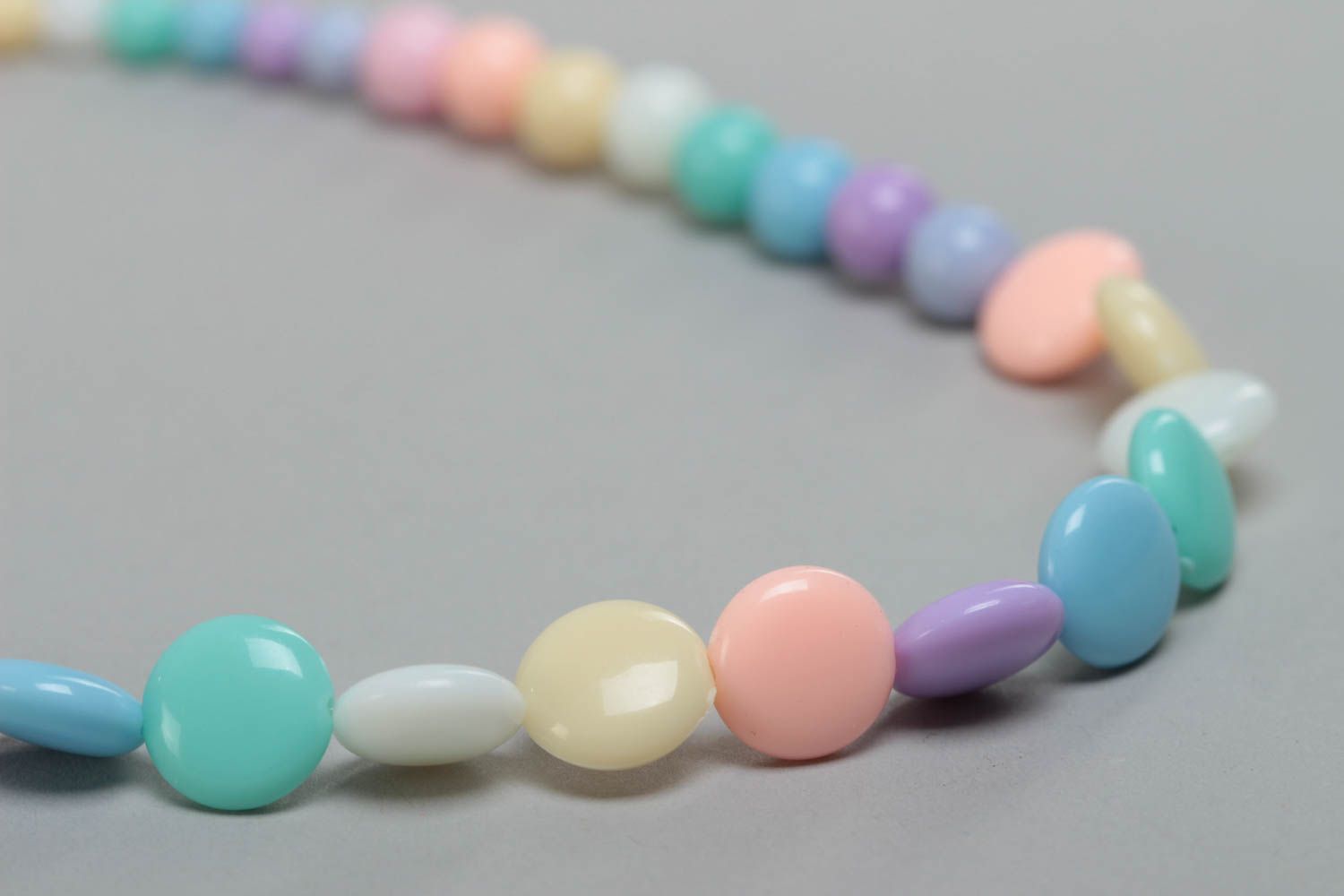 Handmade designer long children's plastic bead necklace of pastel colors photo 3