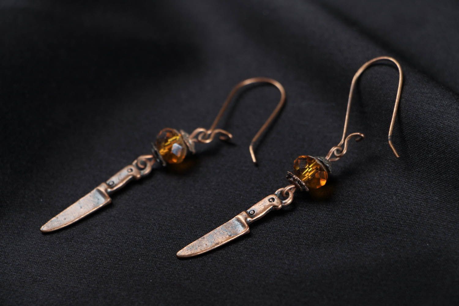 Earrings made of metal and crystal photo 2