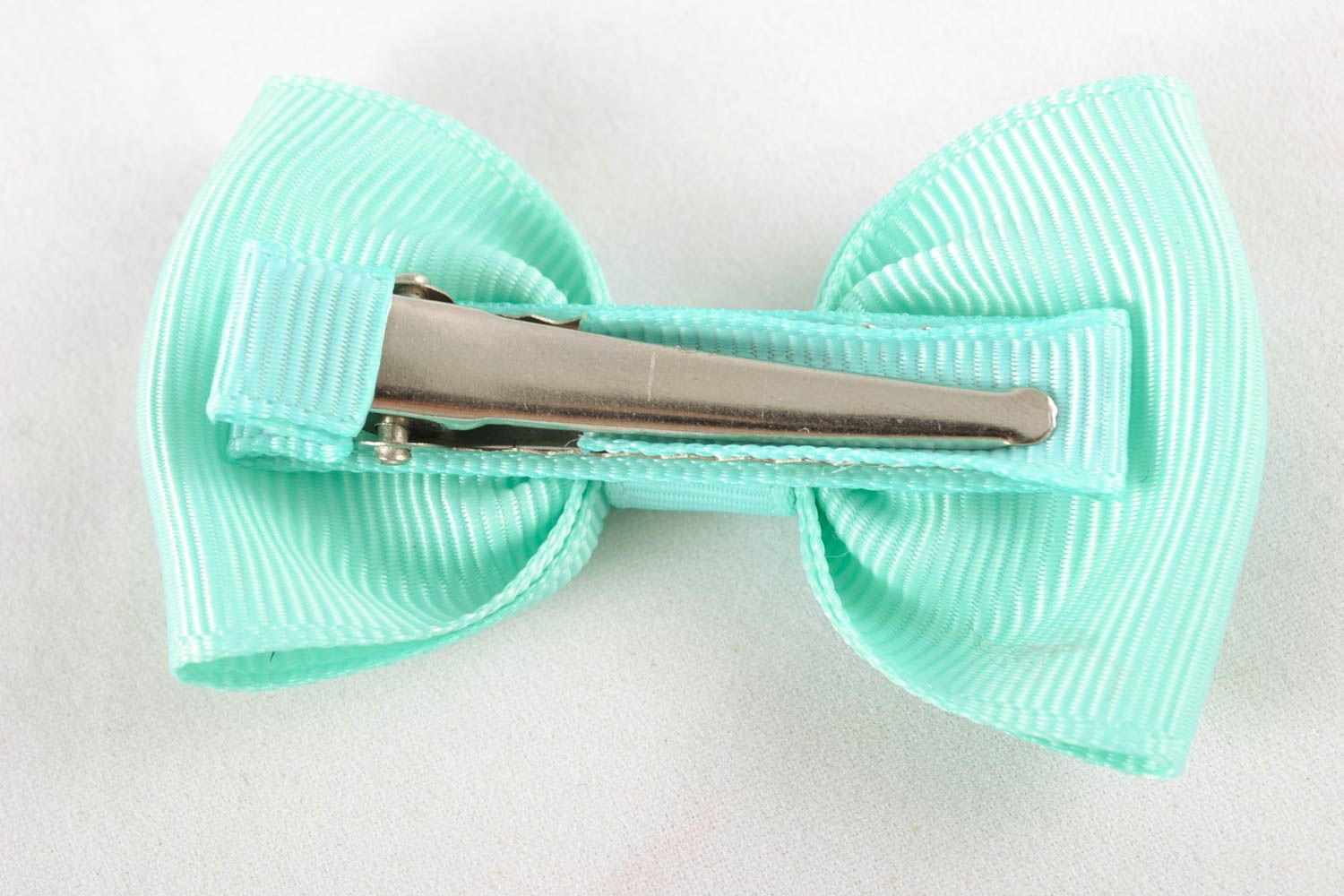 Hair clip with rep ribbon bow of turquoise color photo 3