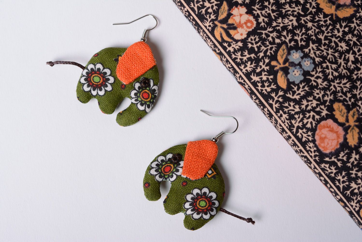 Bright handmade earrings sewn of fabric in green and orange colors elephants photo 1