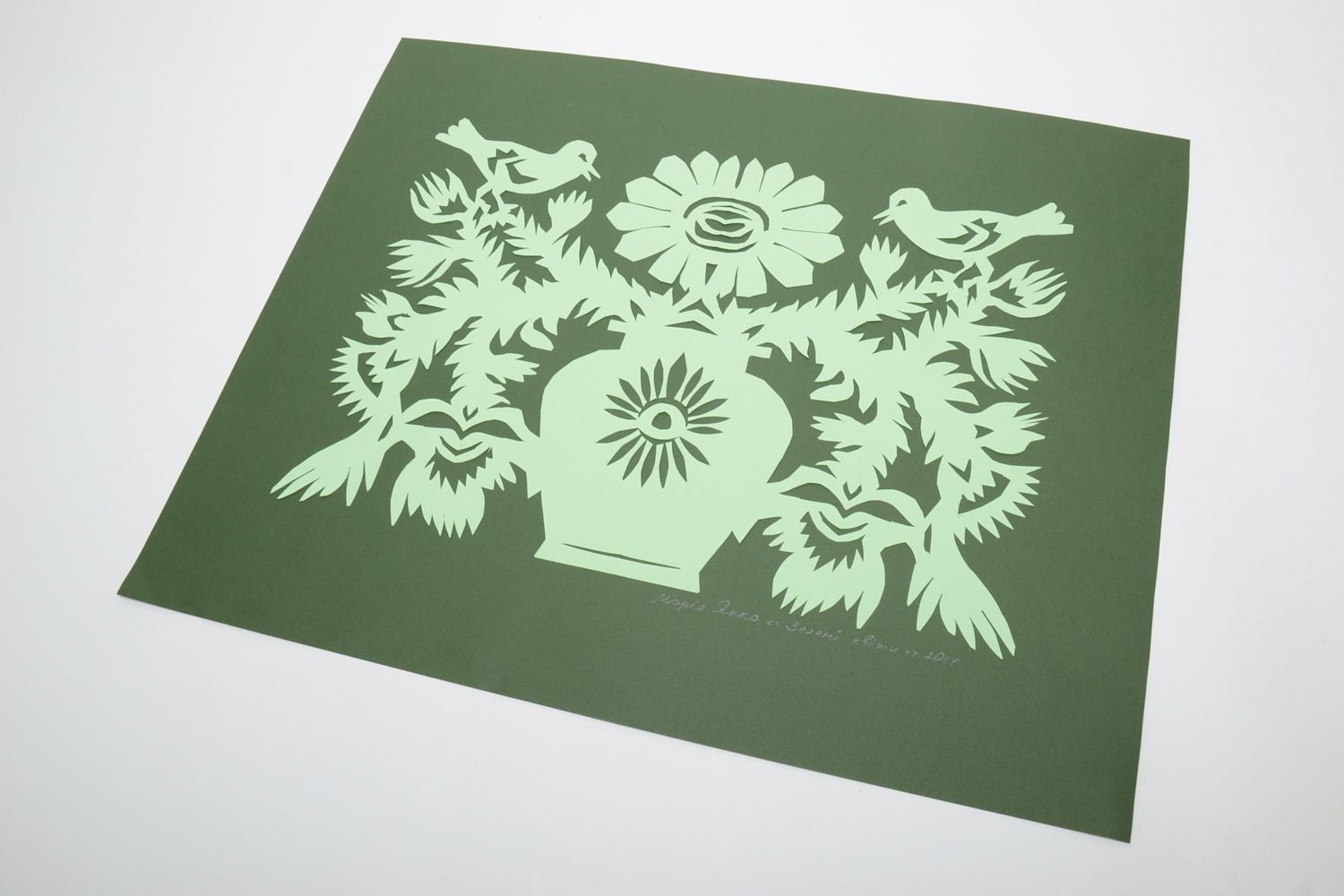 Paper cut out picture on green background Blackthorn photo 2