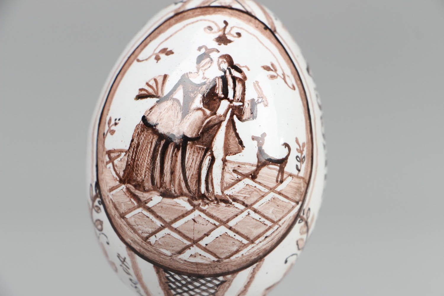 Ceramic egg on pedestal photo 2