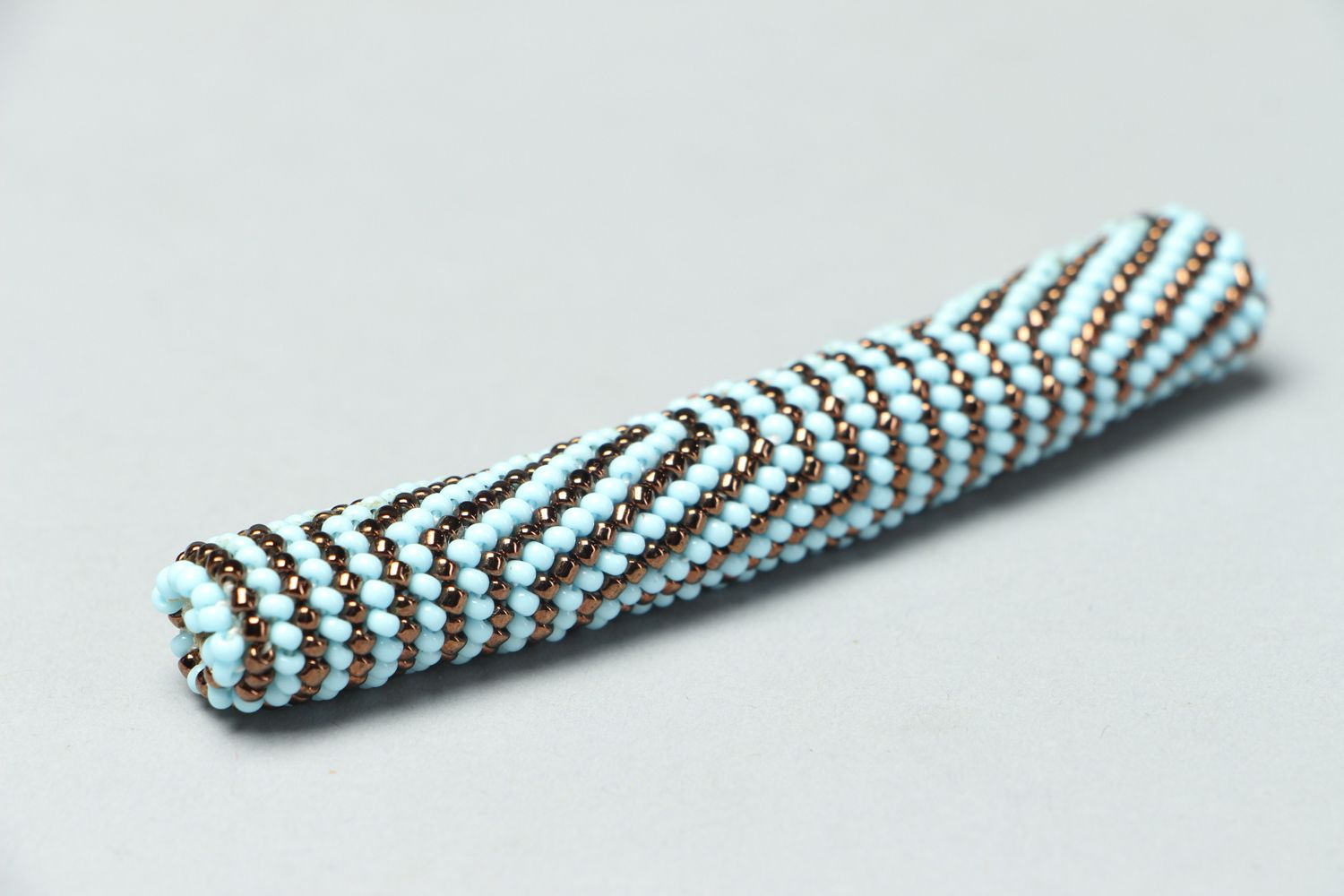 Handmade beaded pendant for rubber cord photo 1