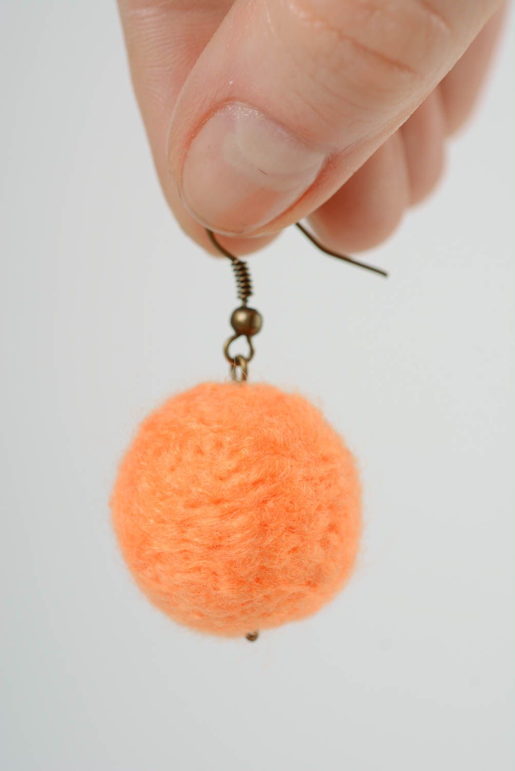 Handmade ball shaped dangling earrings felted of natural wool in peach color photo 2