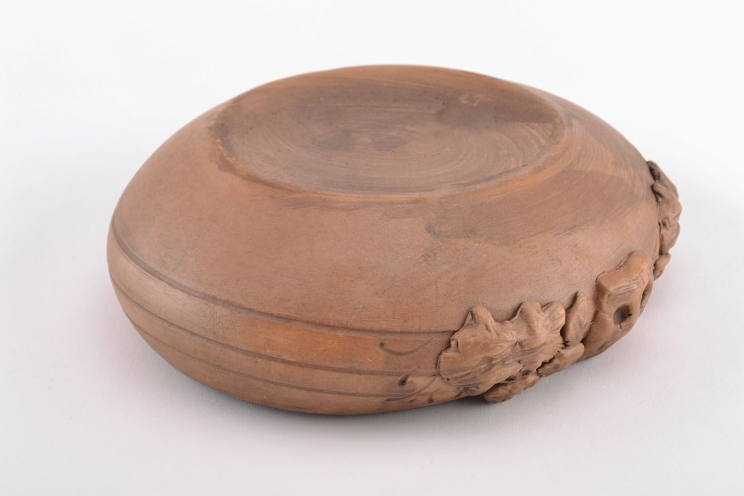 Clay bowl with molded decorative elements photo 4