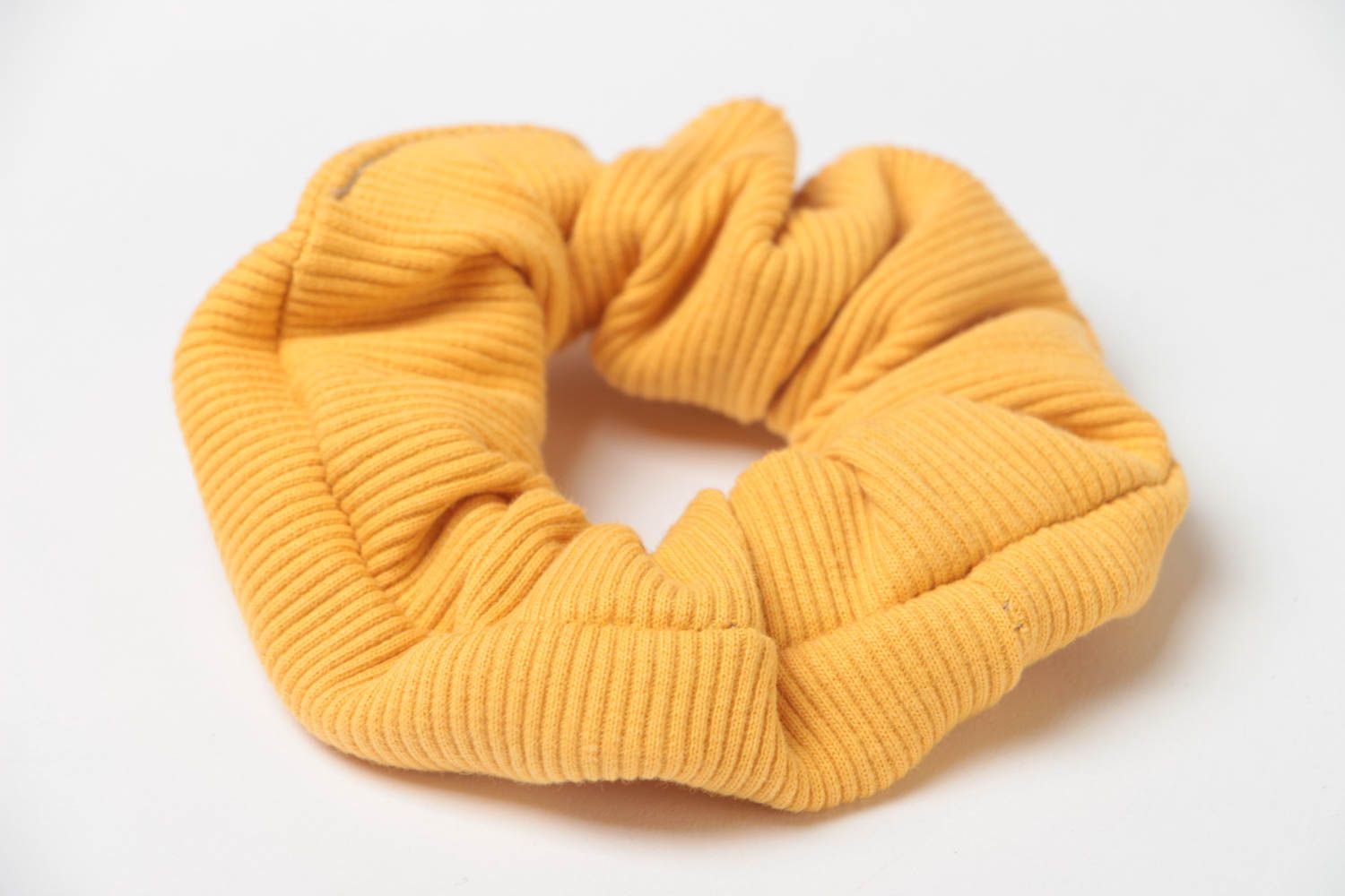 Handmade decorative stretch fabric hair tie of yellow color of laconic design photo 3