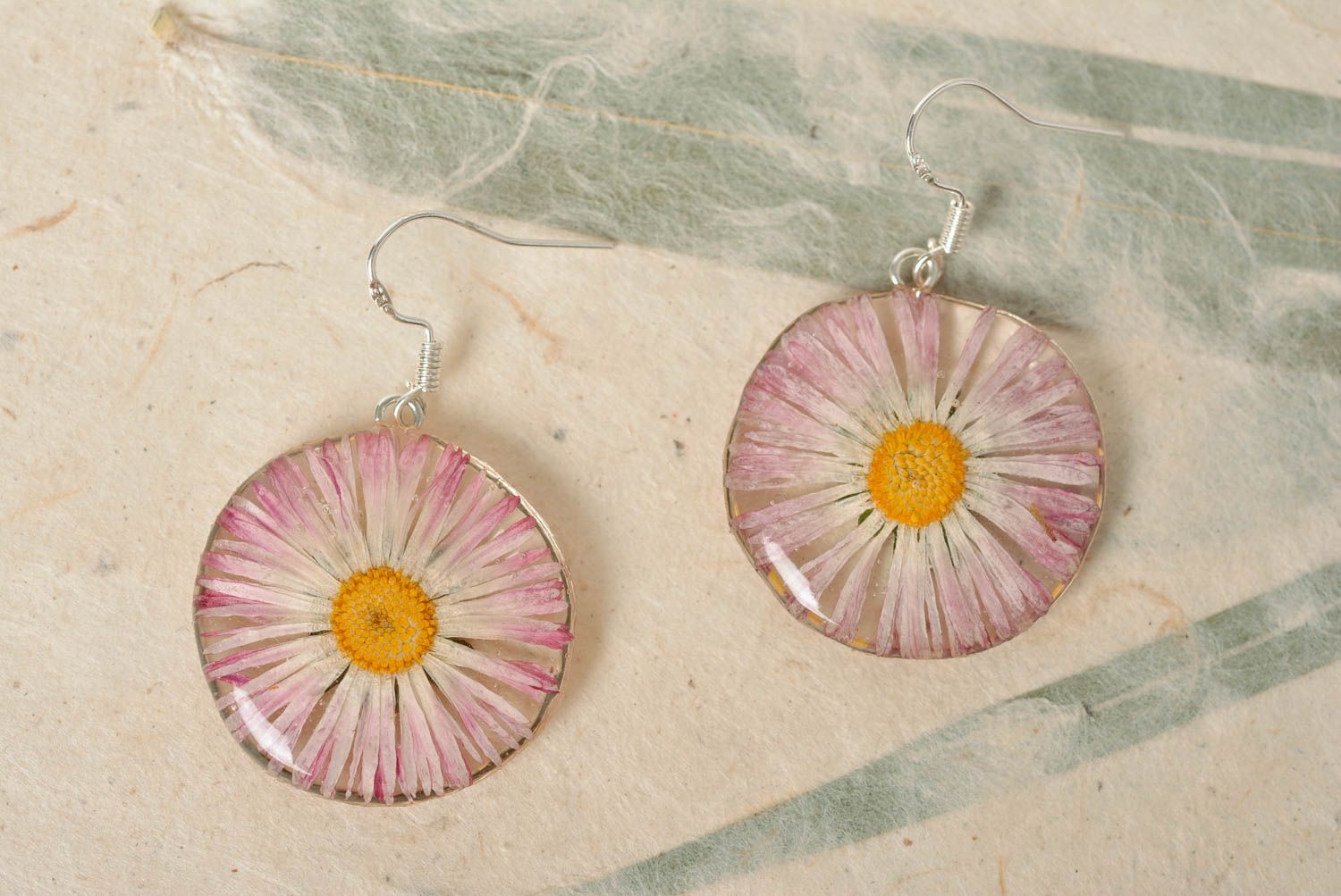 Festive handmade pink dangle earrings with dried flowers coated with epoxy photo 1