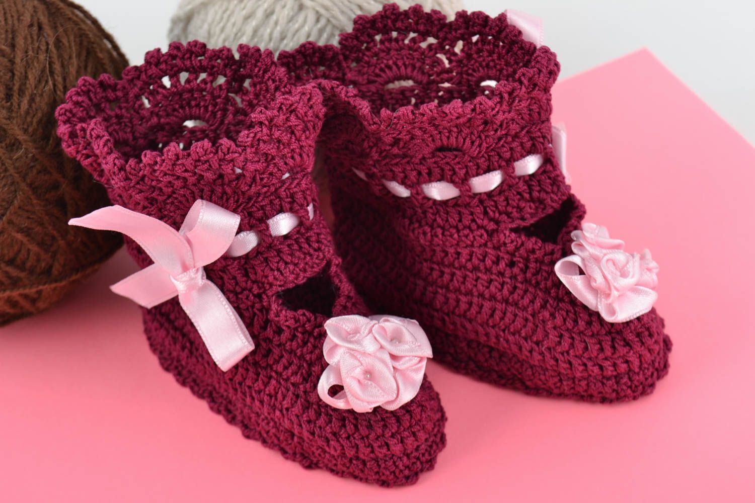 Handmade crocheted lacy baby booties of purple color with pink satin ribbons photo 1