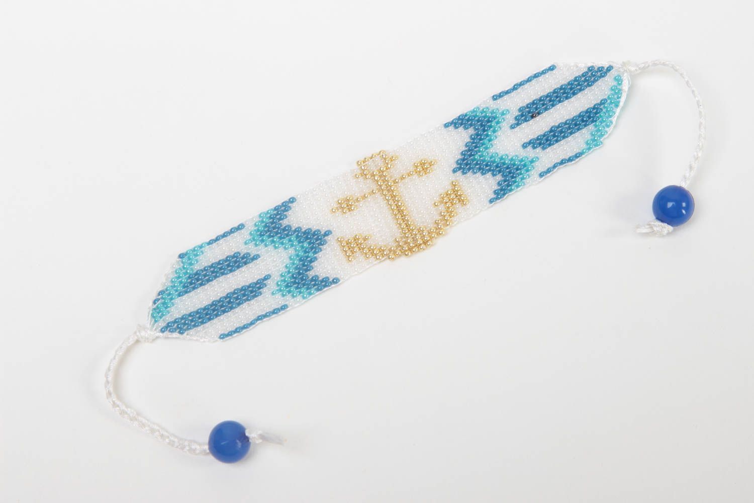Handmade white, blue, and gold color beads strand wrist unisex bracelet with a sea anchor photo 2