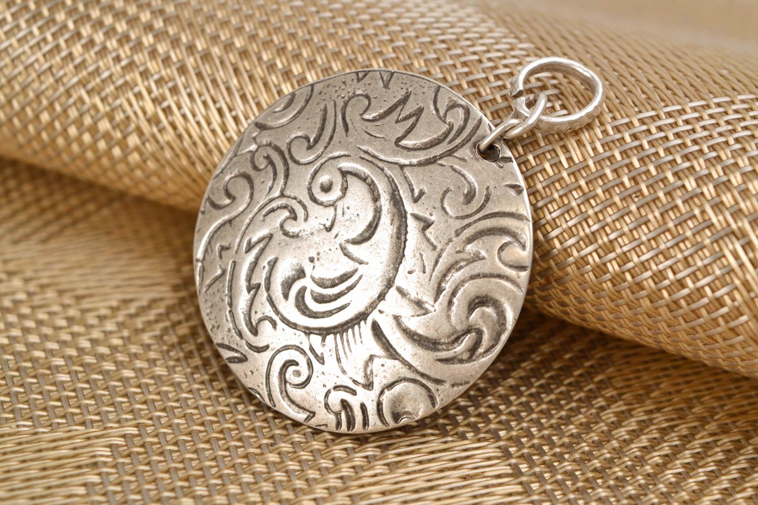 Metal pendant with pattern in the shape of firebird photo 1