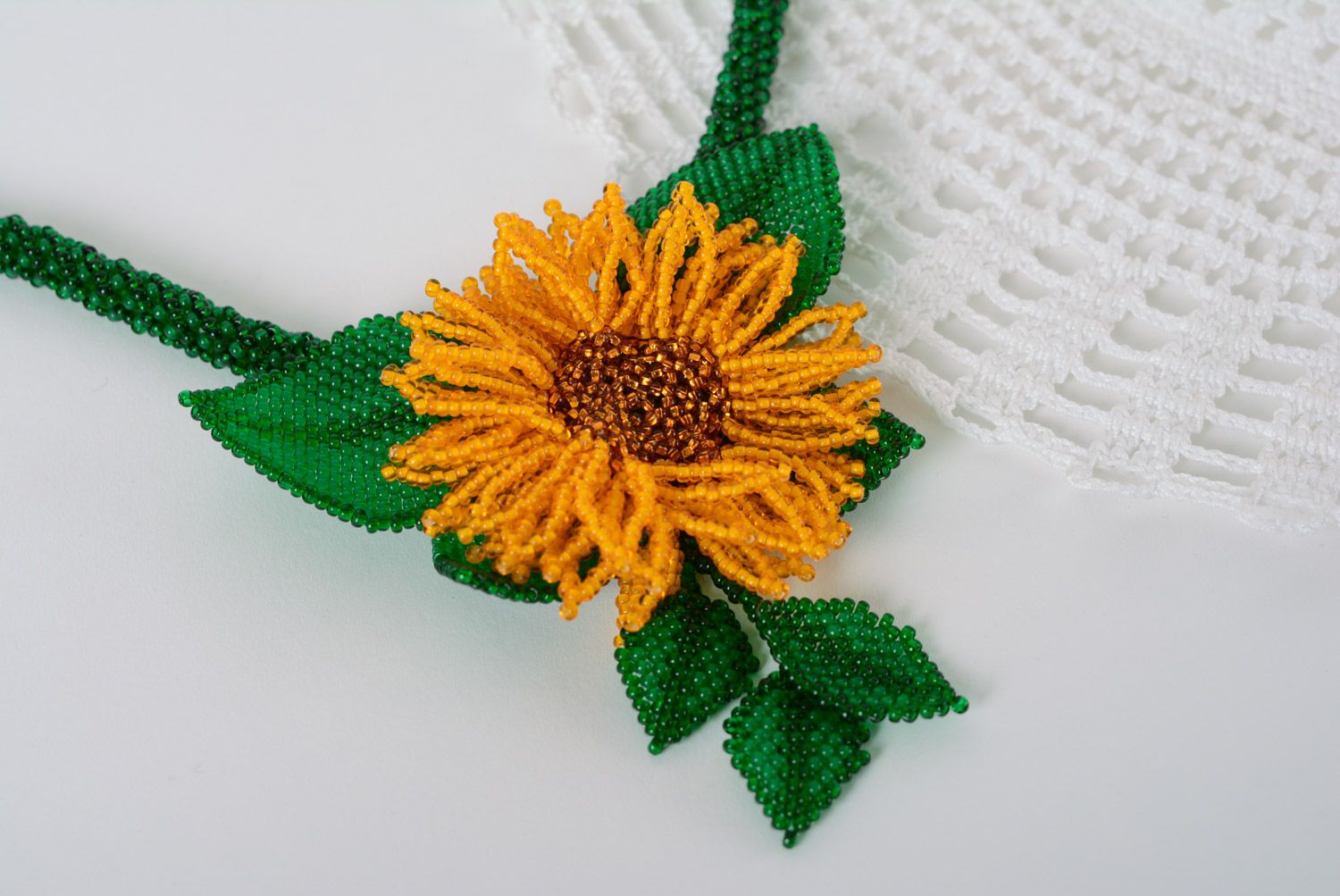 Handmade long beautiful necklace woven of beads in the shape of sunflower photo 1