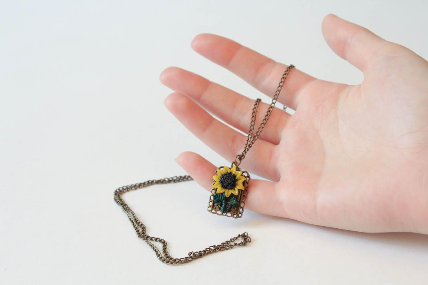 Pendant with sunflower made of polymer clay photo 1