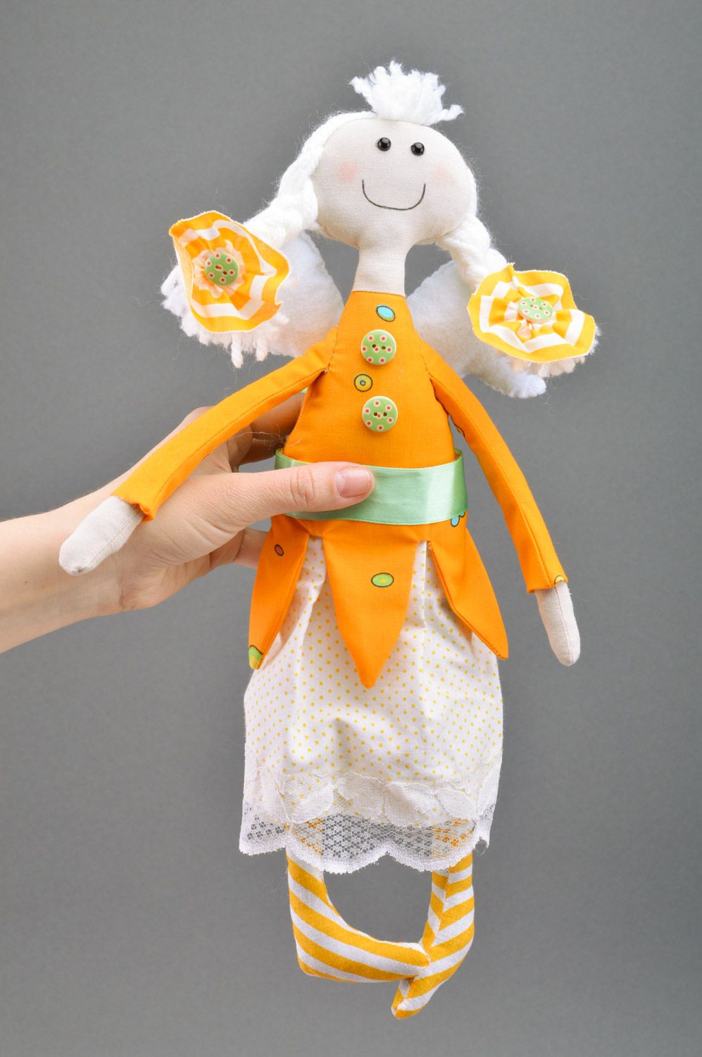 Handmade yellow textile soft doll in the shape of fairy with braids for children photo 3