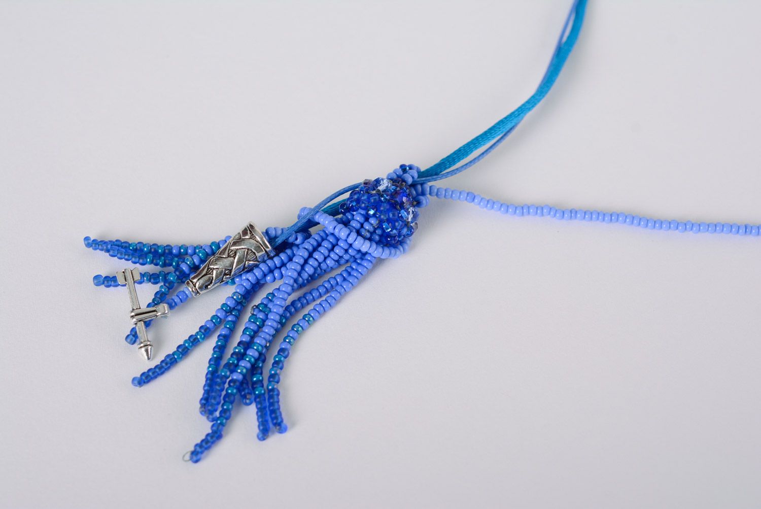 Bright stylish handmade beaded pendant of blue color for women photo 2