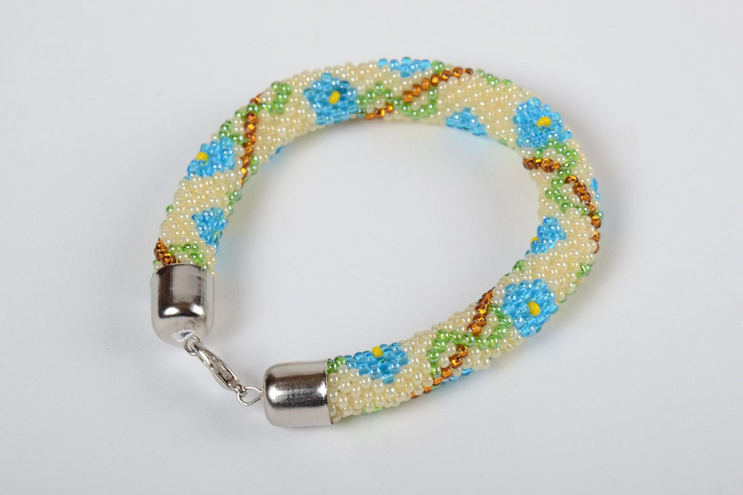 Bright beaded cord adjustable bracelet in ethnic style with floral ornament photo 2