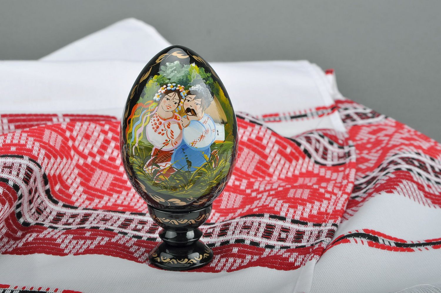 Decorative egg with a holder Ukrainian couple photo 1