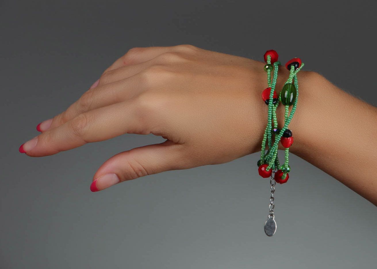 Green bracelet with ladybugs photo 5