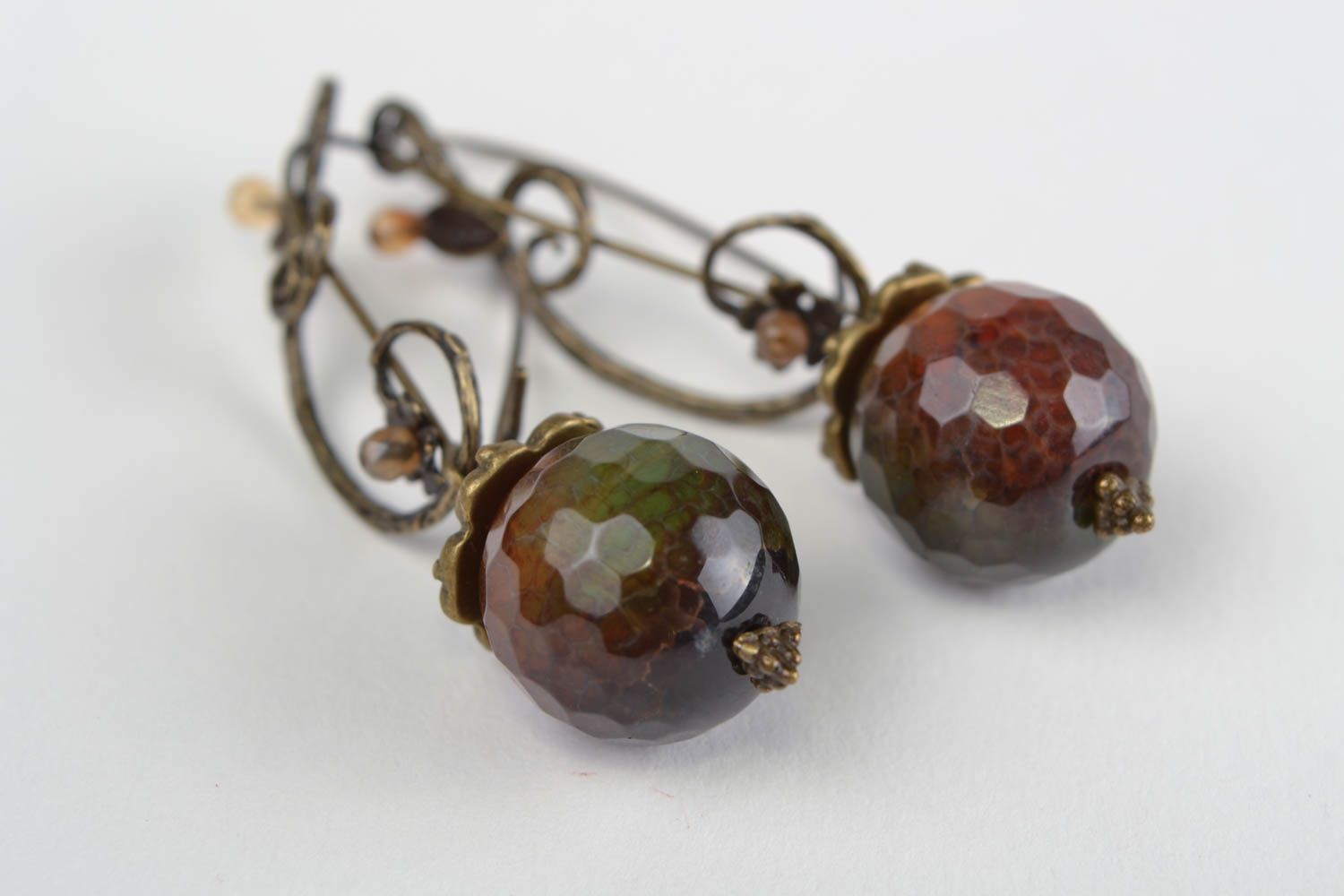 Handmade dangling earrings with fancy metal fittings and snake agate stone beads photo 3