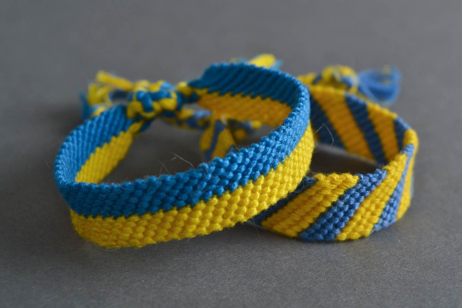 Set of 2 handmade designer yellow and blue macrame friendship wrist bracelets  photo 1