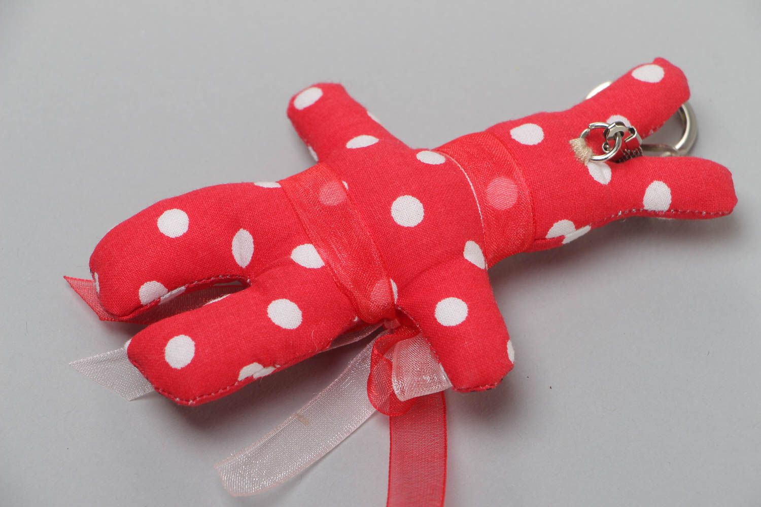 Handmade soft toy keychain sewn of cotton fabric in the shape of red rabbit photo 4