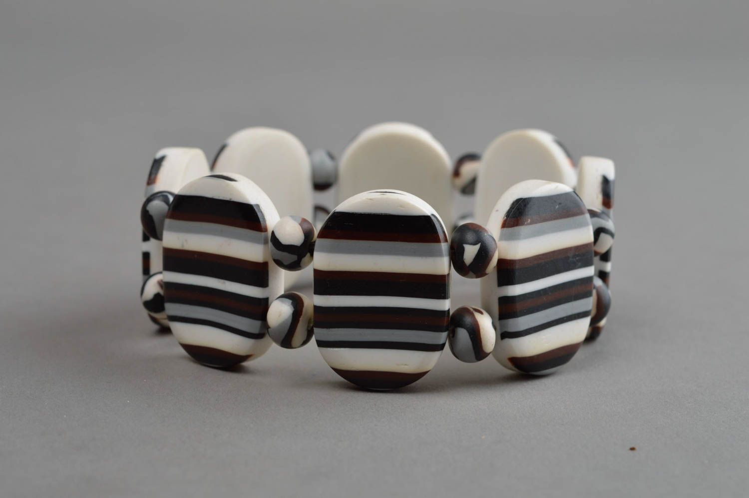 White, grey, brown colors' fashion bracelet on elastic cord photo 2
