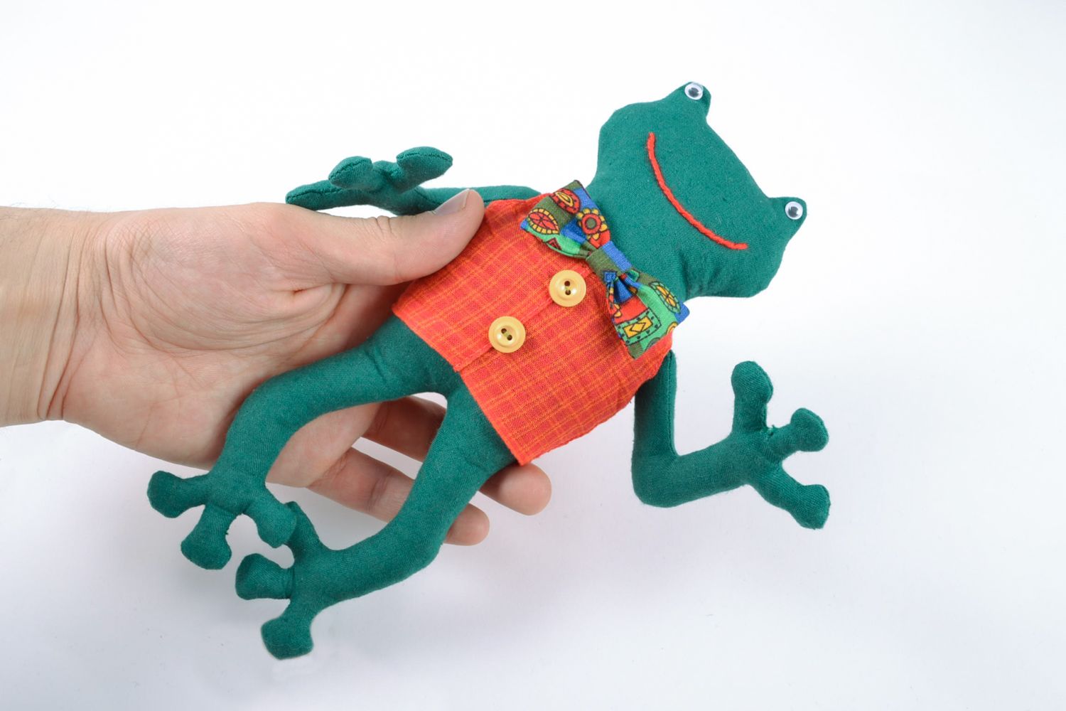 Игрушка из хлопка ручной работы в виде зеленой лягушки фото 1