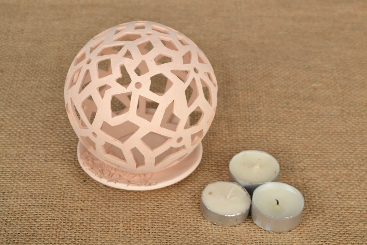 Ceramic candle holder in the shape of a ball photo 1