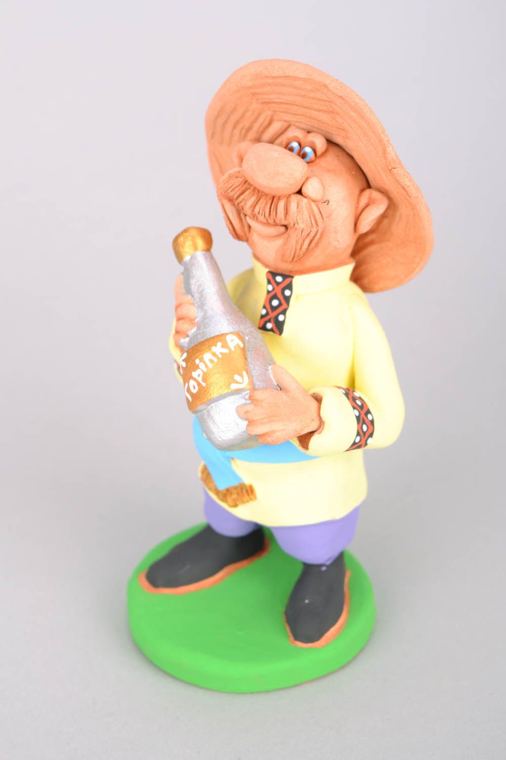 Figurine Cossack with a Bottle of Vodka photo 3