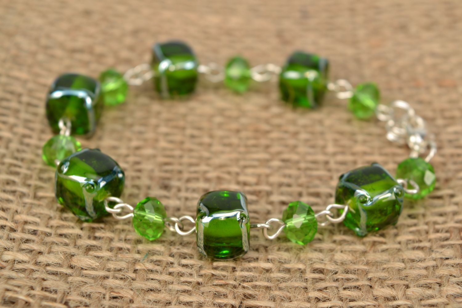 Handmade bracelet with glass beads and crystal of green color photo 1