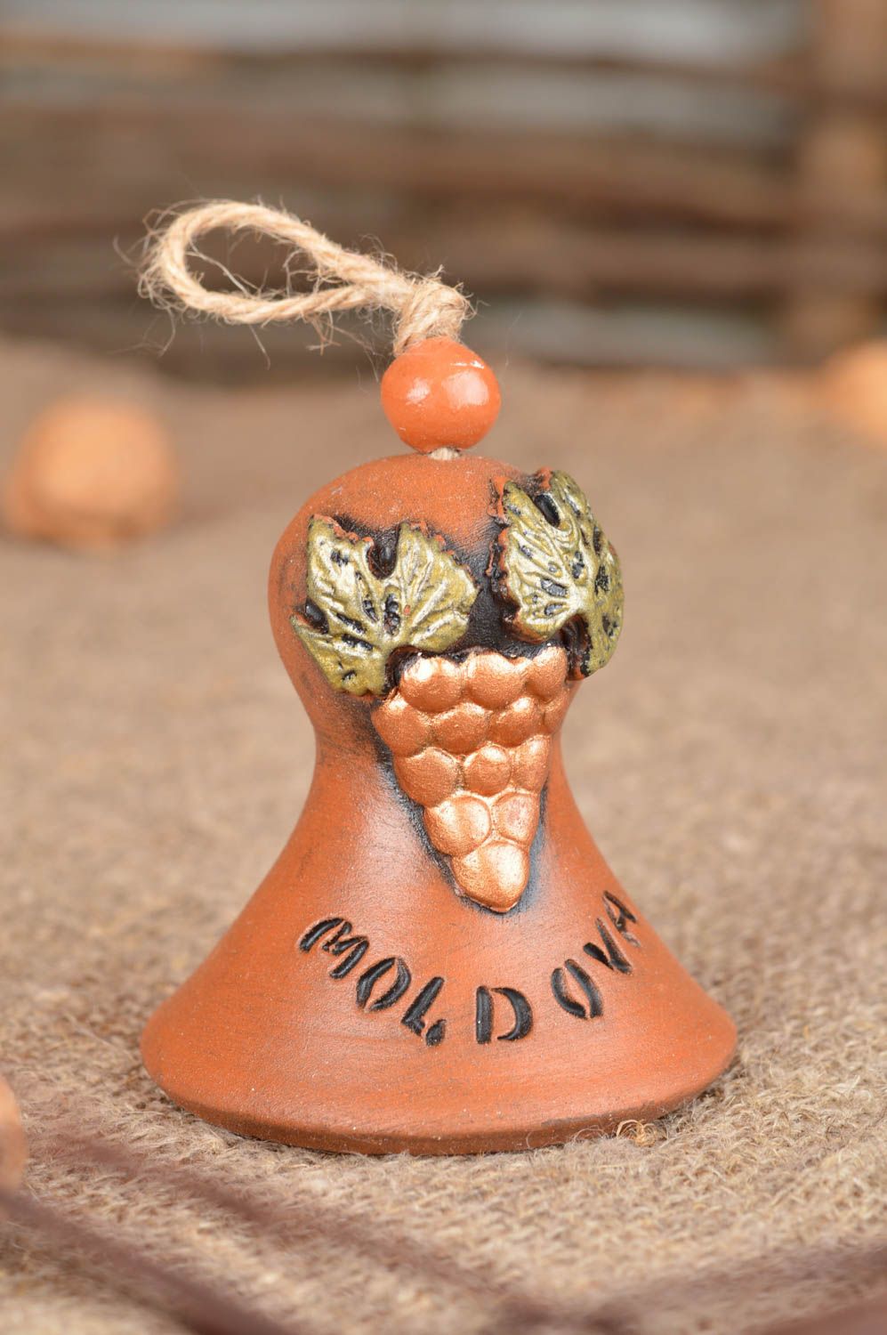 Petite clochette en céramique brune faite main peinte sonore décorative   photo 1