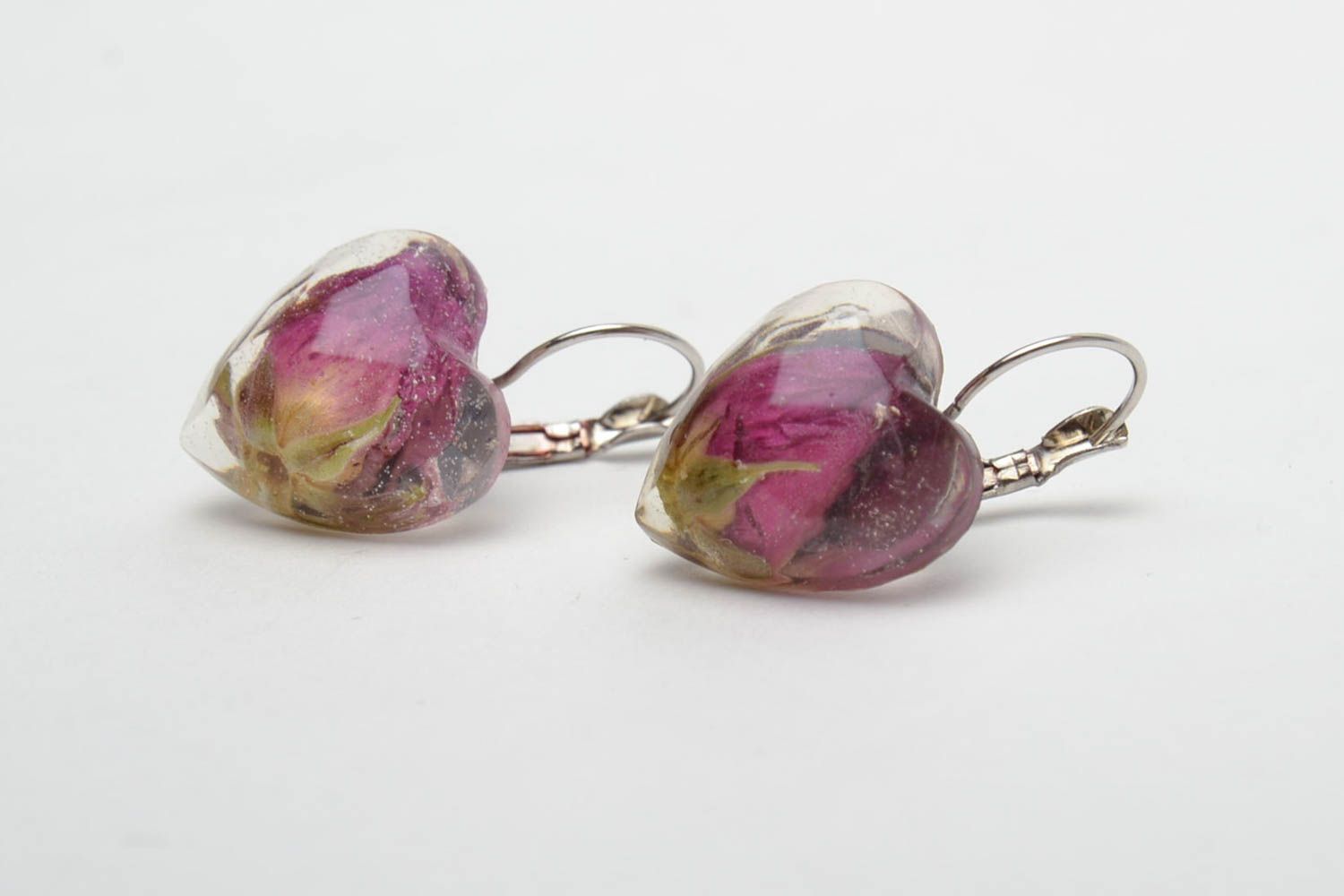 Heart-shaped earrings with natural flowers and epoxy resin photo 4