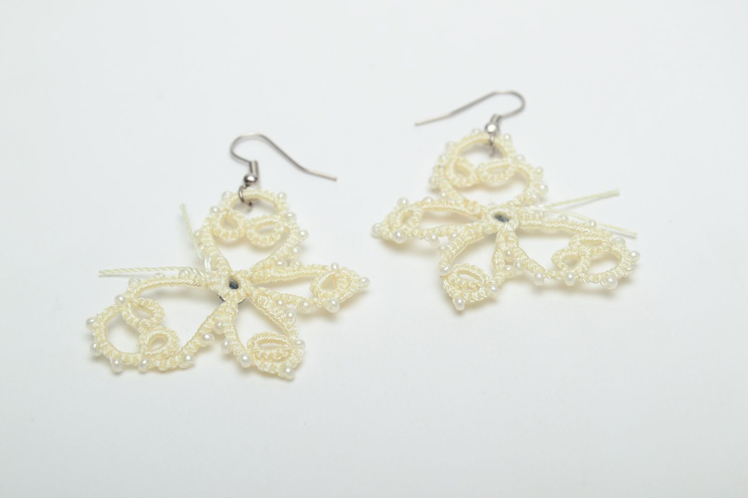 Lace earrings with beads made using tatting technique photo 4