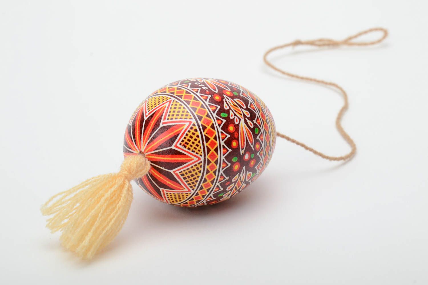 Handmade bright painted Easter egg with tassel for decor photo 4
