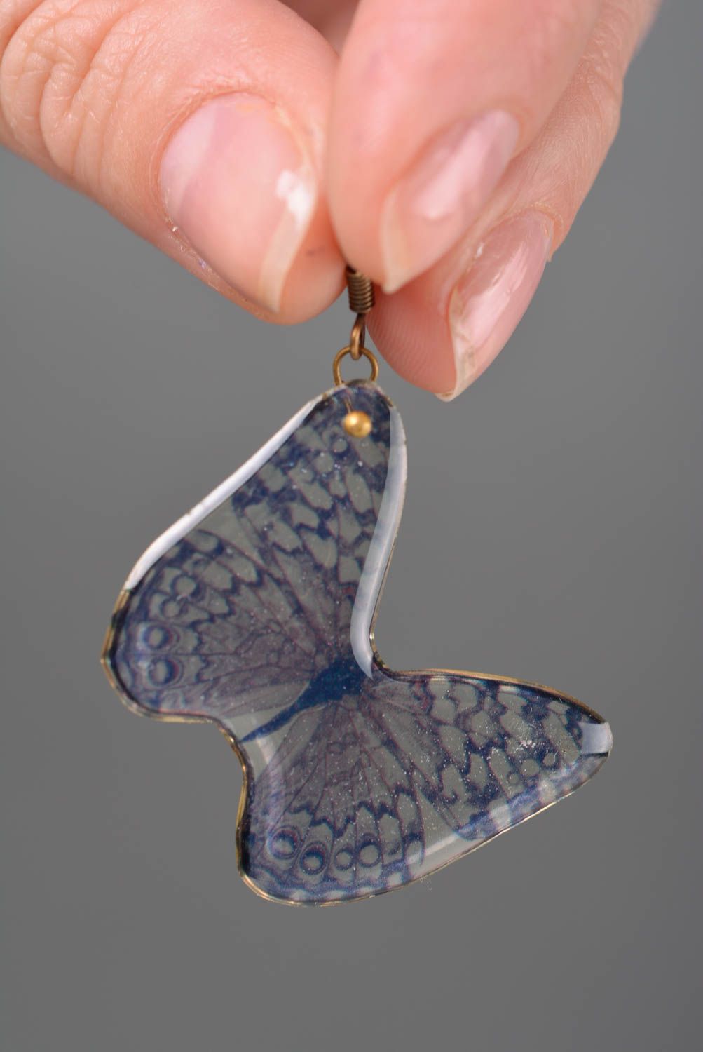 Unusual small handmade designer epoxy earrings in the shape of butterflies photo 2