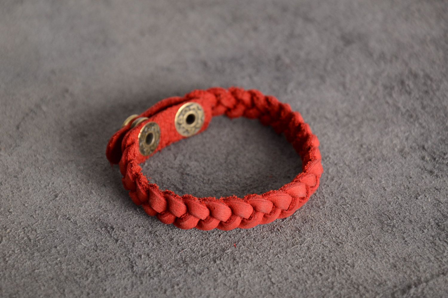 Thin handmade wrist bracelet woven of genuine leather of red color for women photo 1