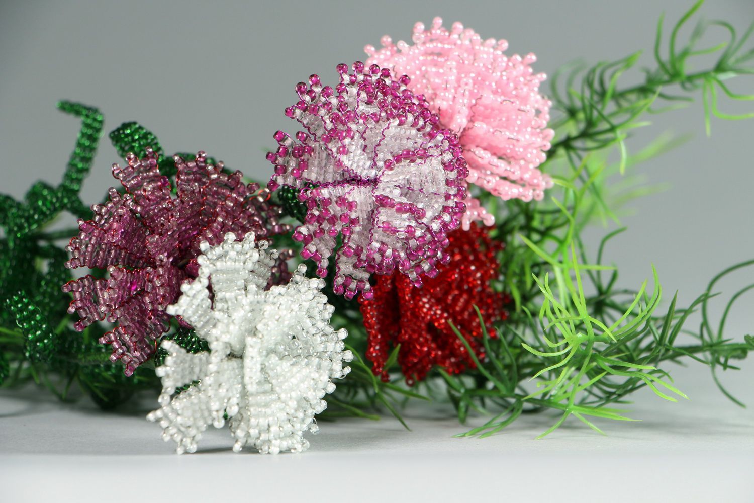Red flowers made from beads Carnations photo 1
