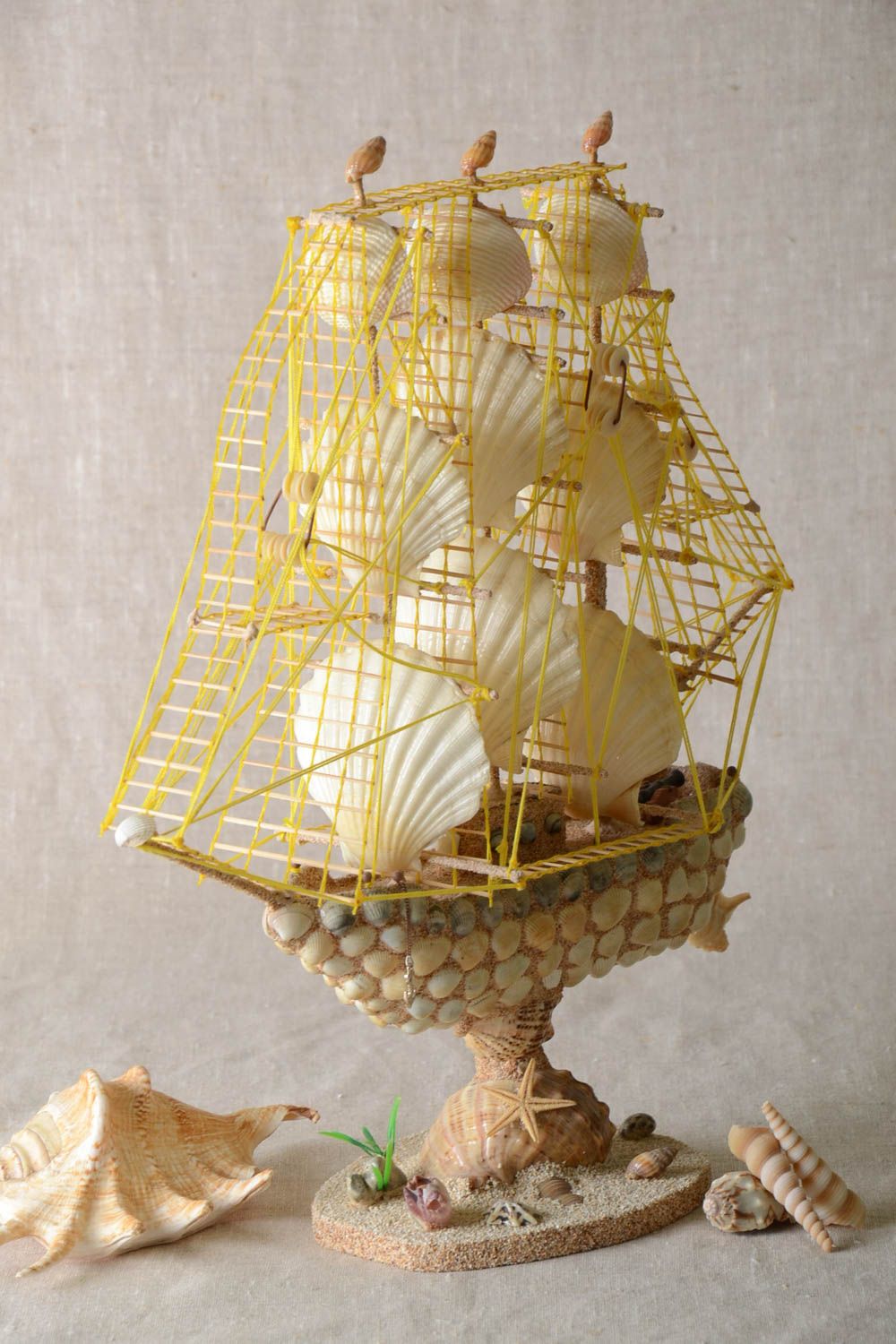 Deko Segelschiff aus Muscheln handgemacht Deko Element Tischdekoration Ideen foto 1