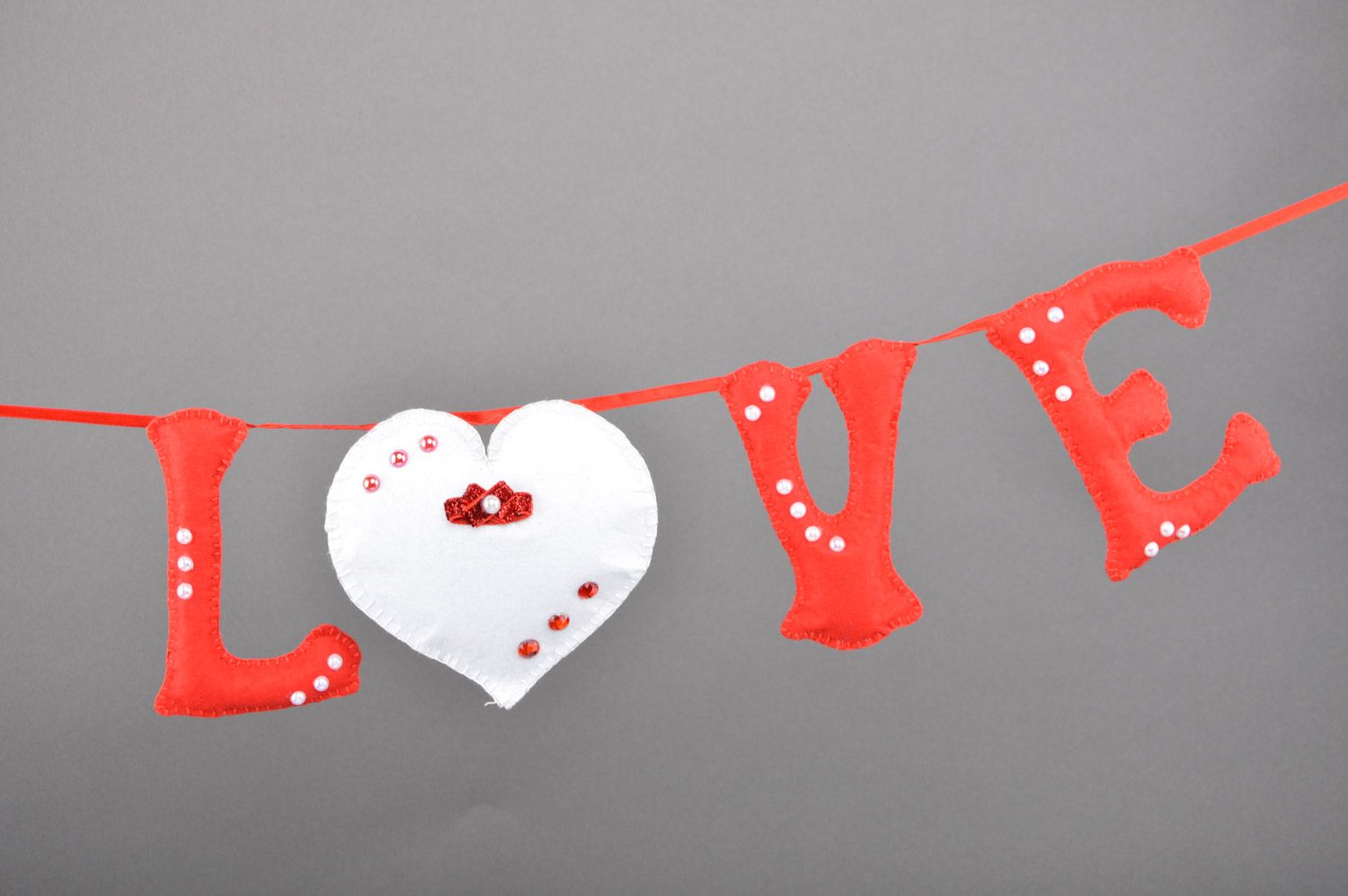 Handmade interior decorative wall letters sewn of red and white felt Love photo 1