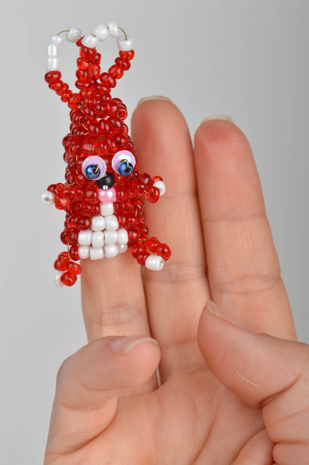 Funny unusual cute rabbit made of beads handmade red finger doll for kids photo 1