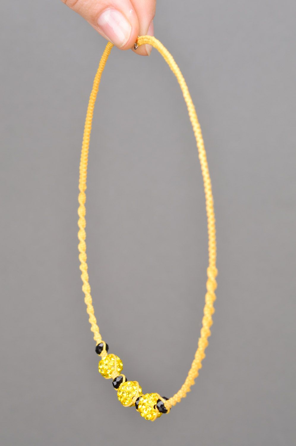 Unusual design handmade necklace woven of threads and beads of yellow color for girls photo 3
